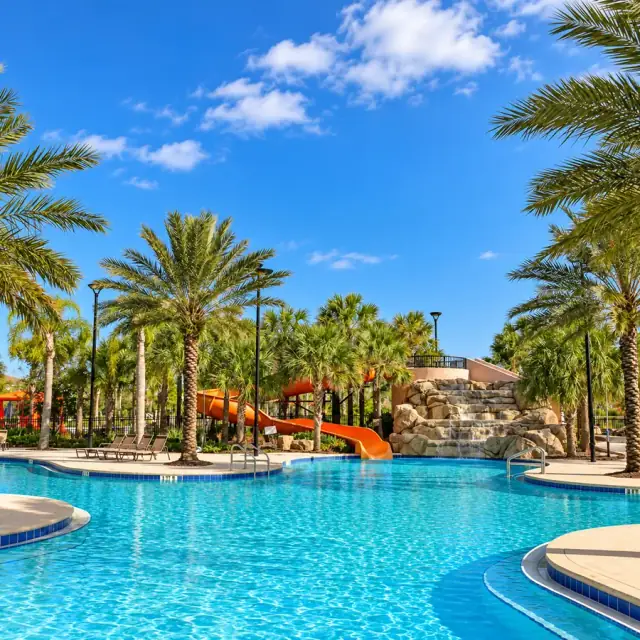 Solterra Resort pool surrounded by palms